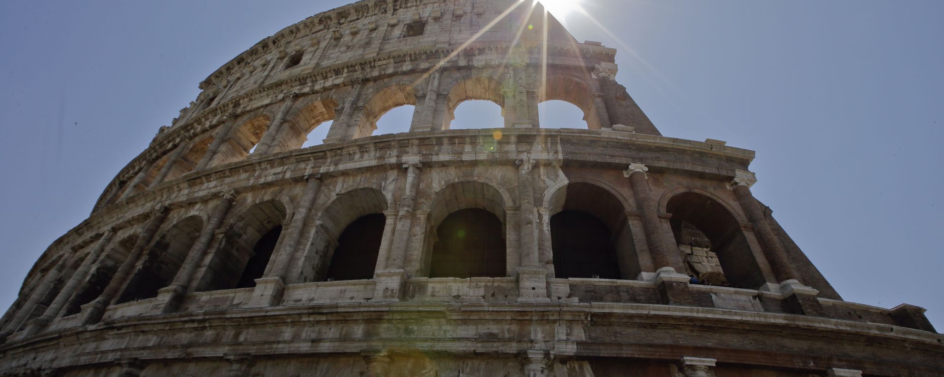 A view of the Colosseum after the first stage of the restoration work was completed in Rome, Friday, July 1st, 2016. The Colosseum has emerged more imposing than ever after its most extensive restoration, a multi-million-euro cleaning to remove a dreary, undignified patina of soot and grime from the ancient arena, assailed by pollution in traffic-clogged Rome. (AP Photo/Andrew Medichini) A view of the Colosseum after the first stage of the restoration work was completed in Rome, Friday, July 1st, 2016. The Colosseum has emerged more imposing than ever after its most extensive restoration, a multi-million-euro cleaning to remove a dreary, undignified patina of soot and grime from the ancient arena, assailed by pollution in traffic-clogged Rome. (AP Photo/Andrew Medichini) - Sputnik International, 1920, 07.01.2023