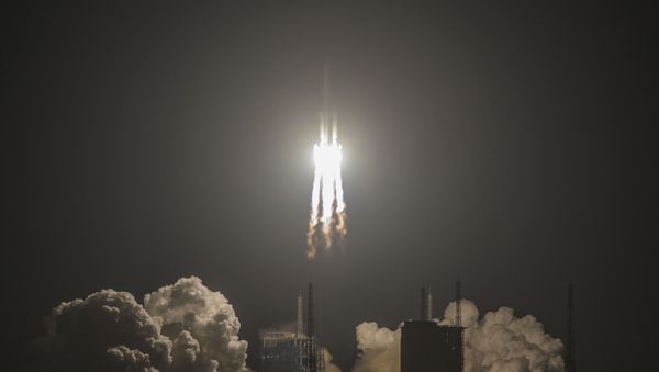China's heavy-lift Long March 5 rocket blasts off from its launch centre in Wenchang, south China's Hainan province on December 27, 2019.  - Sputnik International