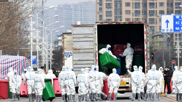 Workers in protective suits take part in the disinfection of Huanan seafood market, where the novel coronavirus is believed to have first surfaced, in Wuhan, Hubei province, China March 4, 2020. cnsphoto via REUTERS.  - Sputnik International