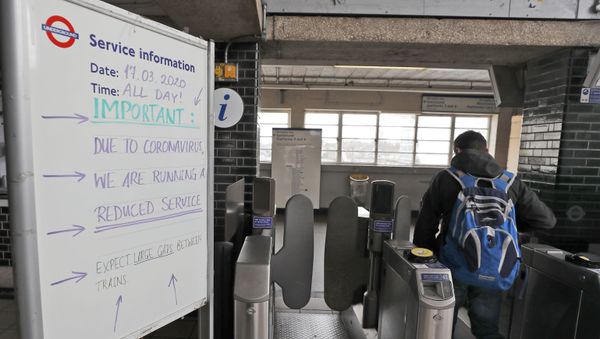 Signs at a London Tube Station notifying the public of a reduced service due to the coronavirus outbreak, Tuesday, 17 March 2020. For most people, the new coronavirus causes only mild or moderate symptoms, such as fever and cough. For some, especially older adults and people with existing health problems, it can cause more severe illness, including pneumonia. Signs at a London Tube Station notifying the public of a reduced service due to the coronavirus outbreak, Tuesday, 17 March 2020. For most people, the new coronavirus causes only mild or moderate symptoms, such as fever and cough. For some, especially older adults and people with existing health problems, it can cause more severe illness, including pneumonia. - Sputnik International