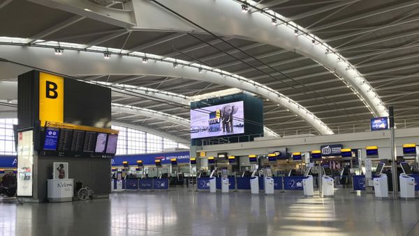 A view of the near empty departure area at London's Heathrow Airport's Terminal 5 departure, Thursday March 12, 2020. As a virus pandemic spreads globally, China and other parts of Asia are scrambling to prevent it from coming back to where it broke out. Everyone arriving in Beijing must quarantine for 14 days, and South Korea is screening arriving passengers from more countries as the number of cases rises across Europe. For most people, the new coronavirus causes only mild or moderate symptoms, such as fever and cough. For some, especially older adults and people with existing health problems, it can cause more severe illness, including pneumonia.  - Sputnik International
