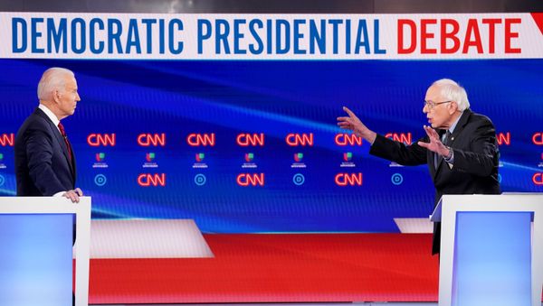 Democratic U.S. presidential candidate and former Vice President Joe Biden listens as Senator Bernie Sanders speaks during the 11th Democratic candidates debate of the 2020 U.S. presidential campaign - Sputnik International