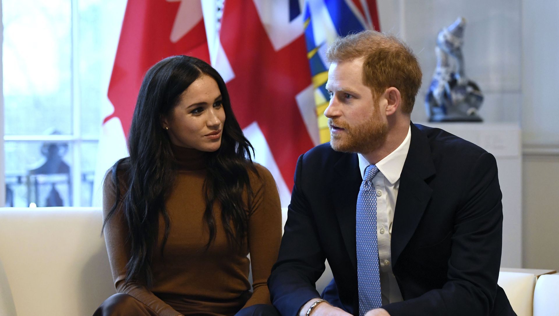 Britain's Prince Harry and Meghan, Duchess of Sussex gesture during their visit to Canada House, thanking the warm Canadian hospitality and support they received during their recent stay in Canada, in London, 7 January 2020 Britain's Prince Harry and Meghan, Duchess of Sussex gesture during their visit to Canada House, thanking the warm Canadian hospitality and support they received during their recent stay in Canada, in London, 7 January 2020 - Sputnik International, 1920, 23.03.2021