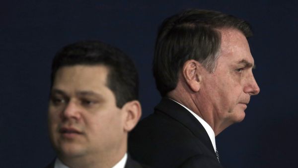 Brazil's President Jair Bolsonaro, right, walks behind the President of the Brazilian National Congress Davi Alcolumbre, during the presentation of the Brazil's new attorney general Augusto Aras, in Brasilia, Brazil, Oct. 2, 2019 - Sputnik International