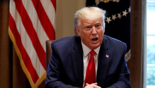 U.S. President Donald Trump speaks as he meets with representatives of U.S. nurses organizations on coronavirus response in the Cabinet Room of the White House in Washington, U.S., March 18, 2020 - Sputnik International