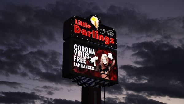 A sign at a strip club advertises coronavirus-free lap dances Friday, March 13, 2020, in Las Vegas - Sputnik International