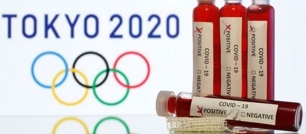 Fake blood in seen in test tubes labelled with coronavirus disease (COVID-19) in front of a displayed Tokyo 2020 Olympics logo in this illustration taken March 19, 2020 Fake blood in seen in test tubes labelled with coronavirus disease (COVID-19) in front of a displayed Tokyo 2020 Olympics logo in this illustration taken March 19, 2020 - Sputnik International