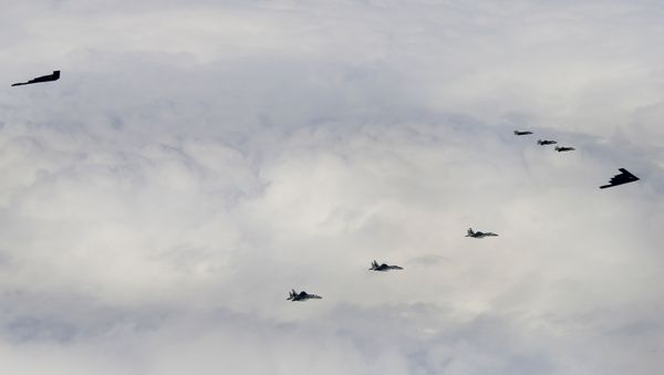 B-2A Spirit bombers assigned to the 509th Bomb Wing, F-15C Eagles assigned to the 48th Fighter Wing and Royal Norwegian Air Force F-35A aircraft conduct aerial operations in support of Bomber Task Force Europe 20-2 over Keflavik, Iceland, March 16, 2020 - Sputnik International