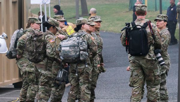 U.S. army soldiers arrive to cooperate at a new drive-thru coronavirus disease (COVID-19) testing center at Bergen Community College in Paramus, New Jersey, U.S., March 20, 2020 U.S. army soldiers arrive to cooperate at a new drive-thru coronavirus disease (COVID-19) testing center at Bergen Community College in Paramus, New Jersey, U.S., March 20, 2020 - Sputnik International