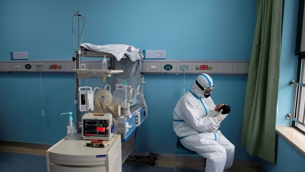 A nurse in protective suit attends to a baby with COVID-19, caused by the coronavirus, at an isolation ward of Wuhan Children's Hospital in Wuhan, Hubei province, China March 16, 2020 A nurse in protective suit attends to a baby with COVID-19, caused by the coronavirus, at an isolation ward of Wuhan Children's Hospital in Wuhan, Hubei province, China March 16, 2020 - Sputnik International