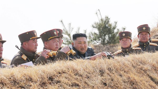 North Korean leader Kim Jong Un guides artillery fire competition in this image released by North Korea's Korean Central News Agency (KCNA) on March 20, 2020 - Sputnik International