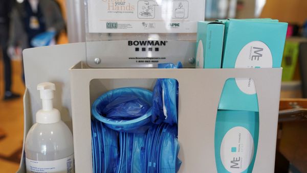Masks and sanitizing items are on hand in a patient check-in desk for coronavirus testing in the emergency room at Fort Belvoir Community Hospital in Fort Belvoir, Virginia, U.S., March 18, 2020 - Sputnik International