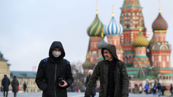 Men wearing masks, the Red Square Men wearing masks, the Red Square - Sputnik International