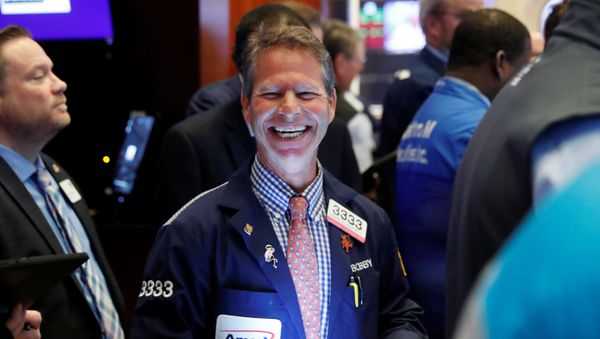 Traders work on the floor of the New York Stock Exchange (NYSE) as the building prepares to close indefinitely due to the coronavirus disease (COVID-19) outbreak in New York, U.S., March 20, 2020. - Sputnik International