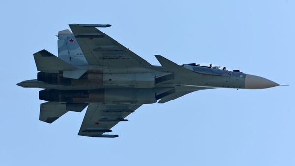 An Su-27 airplane during demonstration performances at the exhibition of weapons and military equipment in Rostov-on-Don. - Sputnik International