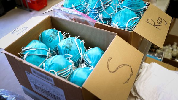 FILE PHOTO: Boxes of N95 protective masks for use by medical field personnel are seen at a New York State emergency operations incident command center during the coronavirus outbreak in New Rochelle, New York, U.S., March 17, 2020. - Sputnik International