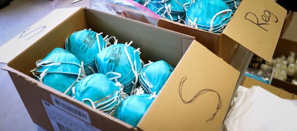FILE PHOTO: Boxes of N95 protective masks for use by medical field personnel are seen at a New York State emergency operations' incident command centre during the coronavirus outbreak in New Rochelle, New York, on 17 March 2020. - Sputnik International