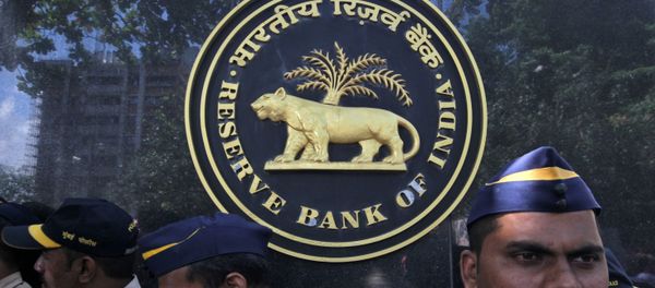 FILE PHOTO: Police stand guard as depositors (unseen) of the Punjab and Maharashtra Co-operative Bank (PMC) attend a protest over the Reserve Bank of India (RBI) curbs on the bank, outside a RBI office in Mumbai, India, October 1, 2019. FILE PHOTO: Police stand guard as depositors (unseen) of the Punjab and Maharashtra Co-operative Bank (PMC) attend a protest over the Reserve Bank of India (RBI) curbs on the bank, outside a RBI office in Mumbai, India, October 1, 2019. - Sputnik International