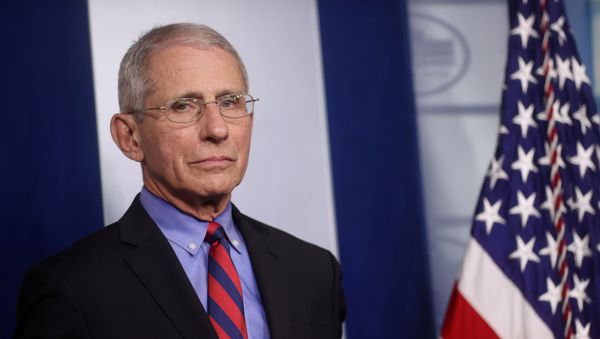 Dr. Anthony Fauci, Director of the National Institute of Allergy and Infectious Diseases, listens as U.S. President Donald Trump answers questions during the coronavirus task force daily briefing at the White House in Washington, U.S., March 25, 2020.  - Sputnik International