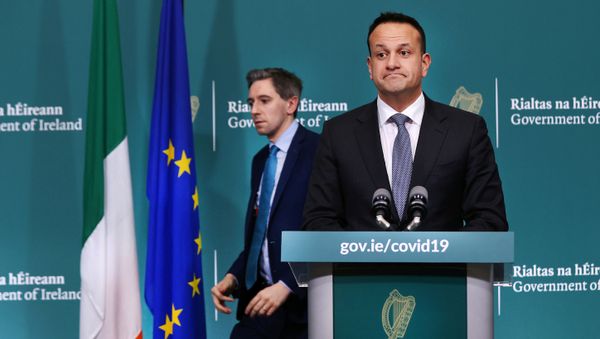 Ireland's Prime Minister Taoiseach Leo Varadkar and Health Minister Simon Harris attend a news conference on the ongoing situation with the coronavirus disease (COVID-19) at Government Buildings in Dublin, Ireland March 24, 2020. Ireland's Prime Minister Taoiseach Leo Varadkar and Health Minister Simon Harris attend a news conference on the ongoing situation with the coronavirus disease (COVID-19) at Government Buildings in Dublin, Ireland March 24, 2020. - Sputnik International