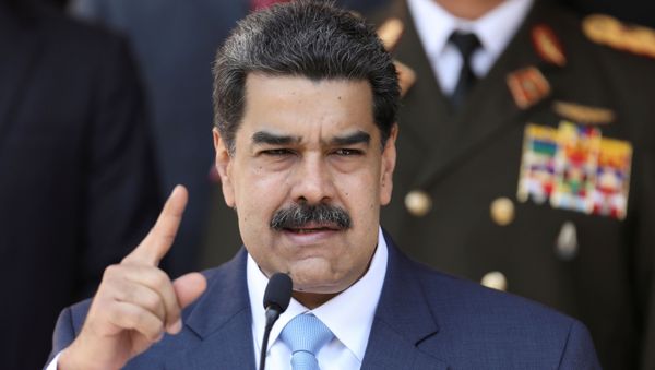 Venezuela's President Nicolas Maduro speaks during a news conference at Miraflores Palace in Caracas, Venezuela, March 12, 2020. - Sputnik International