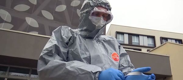 A Russian military expert in a protection suit near hospital facilities for elderly people to fight against the COVID-19 coronavirus infection, in Bergamo, Italy A Russian military expert in a protection suit near hospital facilities for elderly people to fight against the COVID-19 coronavirus infection, in Bergamo, Italy - Sputnik International