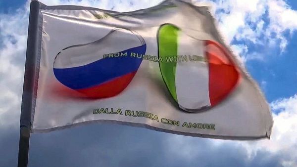A flag on one the vehicle that carries Russian military experts to hospital facilities in Bergamo, Italy A flag on one the vehicle that carries Russian military experts to hospital facilities in Bergamo, Italy - Sputnik International