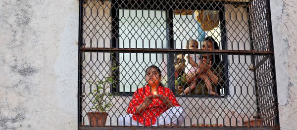 Hindu devotees pray for the eradication of coronavirus during Chaitra Navratri amid a nationwide lockdown to limit the spreading of the virus Hindu devotees pray for the eradication of coronavirus during Chaitra Navratri amid a nationwide lockdown to limit the spreading of the virus - Sputnik International