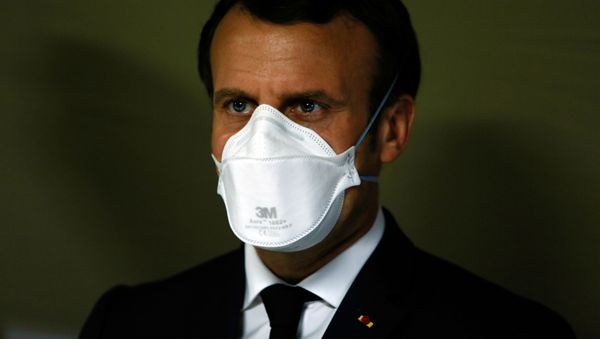 French President Emmanuel Macron wears a face mask during his visit to the military field hospital outside the Emile Muller Hospital in Mulhouse, eastern France March 25, 2020, during a strict lockdown in France to stop the spread of the coronavirus disease (COVID-19).   - Sputnik International