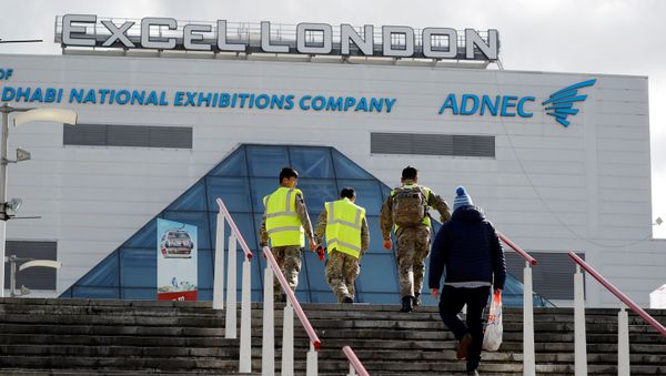 Members of Britain's armed forces arrive at the ExCeL London exhibition centre in London on March 31, 2020, where the NHS Nightingale field hospital has been created to help with the novel coronavirus COVID-19 pandemic. - Sputnik International