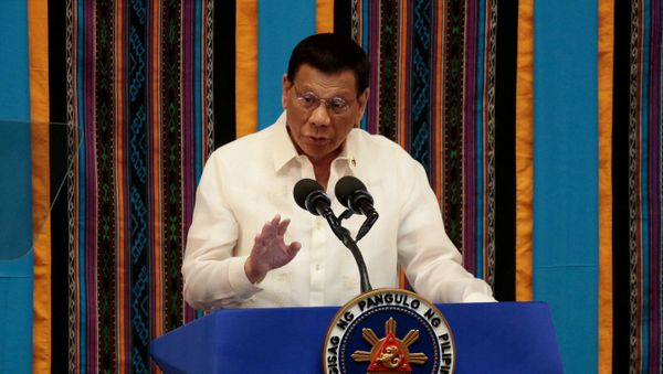 Philippine President Rodrigo Duterte gestures during his fourth State of the Nation Address at the Philippine Congress in Quezon City, Metro Manila, Philippines July 22, 2019. Philippine President Rodrigo Duterte gestures during his fourth State of the Nation Address at the Philippine Congress in Quezon City, Metro Manila, Philippines July 22, 2019. - Sputnik International