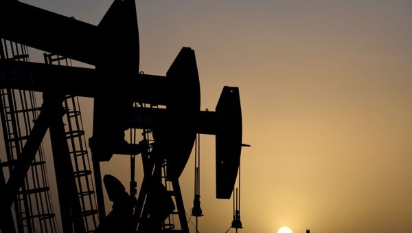 Pump jacks operate at sunset in Midland, Texas, U.S., February 11, 2019. Picture taken February 11, 2019. - Sputnik International