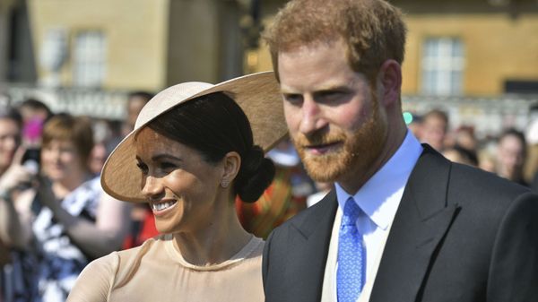 Meghan, the Duchess of Sussex walks with her husband, Prince Harry as they attend a garden party at Buckingham Palace in London, 22 May 2018 Meghan, the Duchess of Sussex walks with her husband, Prince Harry as they attend a garden party at Buckingham Palace in London, 22 May 2018 - Sputnik International