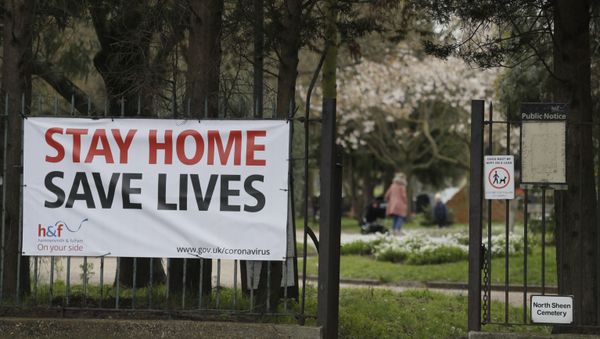 A large sign at the entrance to a park asking people top stay at home to help stop the spread of the coronavirus in London, Wednesday, April 1, 2020. The new coronavirus causes mild or moderate symptoms for most people, but for some, especially older adults and people with existing health problems, it can cause more severe illness or death. - Sputnik International