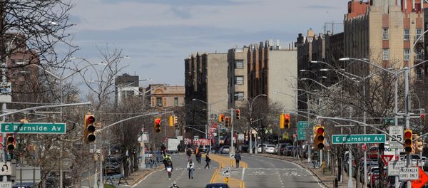 People walk on a temporarily closed section of the Grand Concourse during the outbreak of the coronavirus disease (COVID-19) in the Bronx borough of New York City, New York, U.S., April 2, 2020 People walk on a temporarily closed section of the Grand Concourse during the outbreak of the coronavirus disease (COVID-19) in the Bronx borough of New York City, New York, U.S., April 2, 2020 - Sputnik International