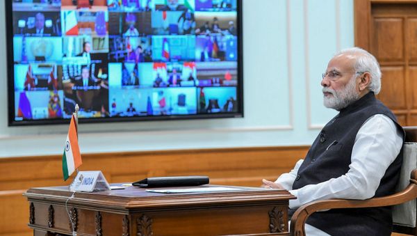In this handout photo taken and released by Indian Press Information Bureau (PIB) on March 26, 2020, India's Prime Minister Narendra Modi attends a videoconference with G20 leaders to discuss the COVID-19 coronavirus, in New Delhi - Sputnik International