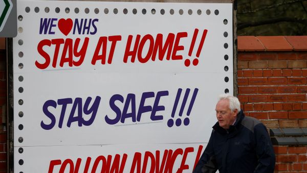 People walk past a message supporting the NHS as the spread of the coronavirus disease (COVID-19) continues, Liverpool, Britain, April 2, 2020 People walk past a message supporting the NHS as the spread of the coronavirus disease (COVID-19) continues, Liverpool, Britain, April 2, 2020 - Sputnik International