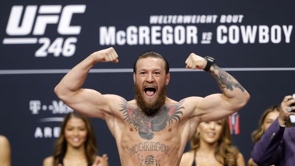Welterweight fighter Conor McGregor poses on the scale during a ceremonial weigh-in for UFC 246 at Park Theater at Park MGM on January 17, 2020 in Las Vegas, Nevada - Sputnik International