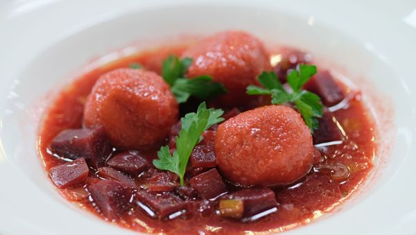 View of beet Kibbeh Iraqi dumpling soup finished dish during Chef Einat Admony's Iraqi Made Easy class at The 8th Annual New York Culinary Experience Presented By New York Magazine And The International Culinary Center - Day 2 at New York Culinary Experience on April 17, 2016 in New York City - Sputnik International