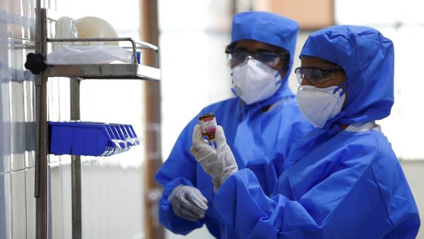 FILE PHOTO: Medical staff with protective clothing are seen inside a ward specialised in receiving any person who may have been infected with coronavirus, at the Rajiv Ghandhi Government General hospital in Chennai, India, January 29, 2020.  - Sputnik International