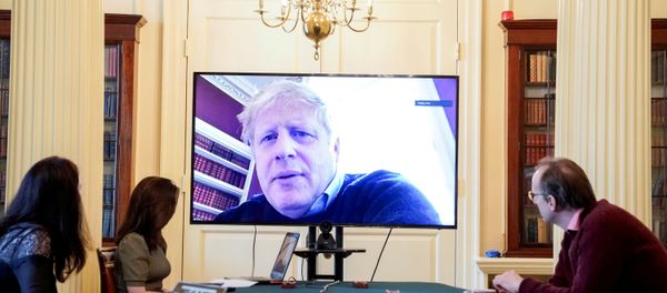 Britain's Prime Minister Boris Johnson appears on a monitor for the coronavirus disease (COVID-19) meeting in London, Britain March 28, 2020 Britain's Prime Minister Boris Johnson appears on a monitor for the coronavirus disease (COVID-19) meeting in London, Britain March 28, 2020 - Sputnik International