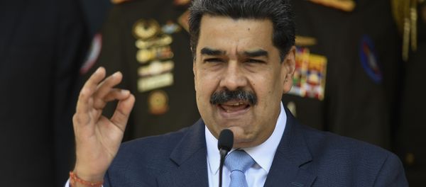Venezuelan President Nicolas Maduro gives a press conference at the Miraflores Presidential Palace in Caracas, Venezuela, Thursday, March 12, 2020.  - Sputnik International