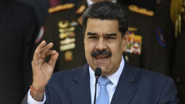 Venezuelan President Nicolas Maduro gives a press conference at the Miraflores Presidential Palace in Caracas, Venezuela, Thursday, March 12, 2020.  - Sputnik International