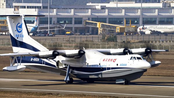 In this Dec. 24, 2017, photo released by Xinhua News Agency, China's AG600, the world's largest amphibious aircraft, also known as Kunlong performs its maiden flight in Zhuhai, south China's Guangdong Province. A Chinese media report says the newly developed sea plane that could expand the military's room to operate in the South China Sea has passed a series of on-water tests. - Sputnik International