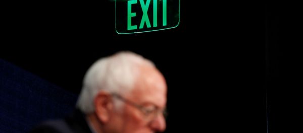 U.S. Democratic presidential candidate Senator Bernie Sanders announces that he will be continuing his campaign for U.S. president at least through his March 15 debate with former Vice President Joe Biden as he holds a news conference in Burlington, Vermont, U.S. March 11, 2020 - Sputnik International