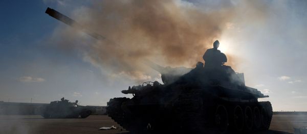 Members of Libyan National Army (LNA) commanded by Khalifa Haftar, get ready before heading out of Benghazi to reinforce the troops advancing to Tripoli, in Benghazi, Libya April 13, 2019. Members of Libyan National Army (LNA) commanded by Khalifa Haftar, get ready before heading out of Benghazi to reinforce the troops advancing to Tripoli, in Benghazi, Libya April 13, 2019. - Sputnik International