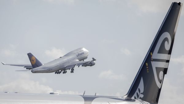A Lufthansa aircraft repatriating German tourists takes off headed to Frankfurt from Christchurch Airport in Christchurch on April 8, 2020. - Sputnik International