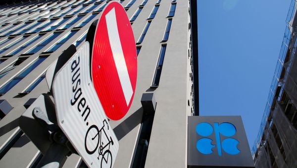 The logo of the Organization of the Petroleoum Exporting Countries (OPEC) and a traffic sign are seen outside of OPEC's headquarters in Vienna, Austria April 9, 2020 The logo of the Organization of the Petroleoum Exporting Countries (OPEC) and a traffic sign are seen outside of OPEC's headquarters in Vienna, Austria April 9, 2020 - Sputnik International