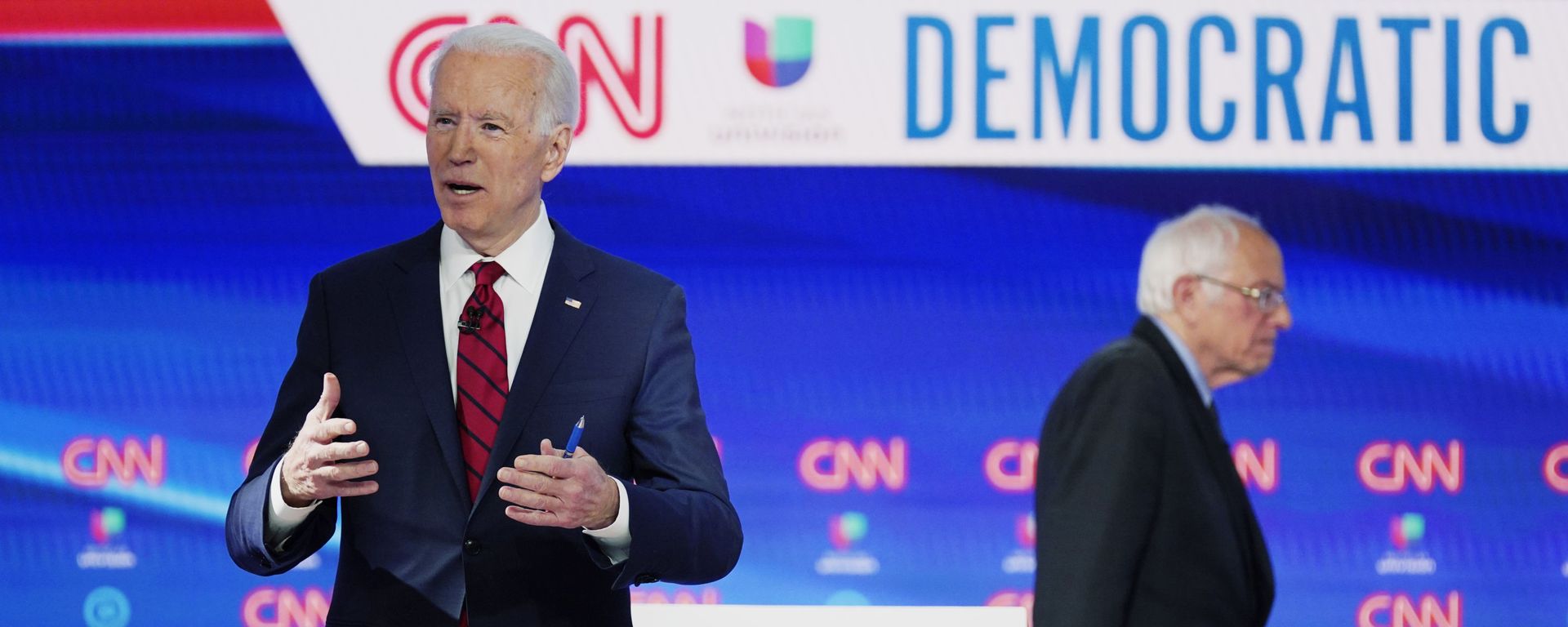In this March 15, 2020, file photo, former Vice President Joe Biden prepares for a Democratic presidential primary debate with Sen. Bernie Sanders, I-Vt., at CNN Studios in Washington. - Sputnik International, 1920, 16.11.2022