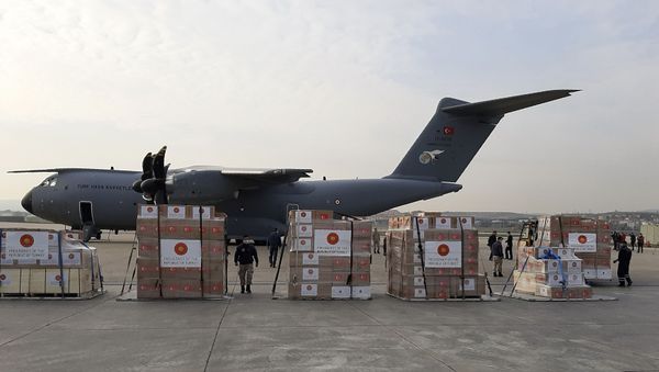 Soldiers prepare to load a military cargo plane with Personal Protection Equipment heading to Italy and Spain to help the countries combat the new coronavirus outbreak, in Ankara, Turkey, Wednesday, 1 April 2020. The new coronavirus causes mild or moderate symptoms for most people, but for some, especially older adults and people with existing health problems, it can cause more severe illness or death. Soldiers prepare to load a military cargo plane with Personal Protection Equipment heading to Italy and Spain to help the countries combat the new coronavirus outbreak, in Ankara, Turkey, Wednesday, 1 April 2020. The new coronavirus causes mild or moderate symptoms for most people, but for some, especially older adults and people with existing health problems, it can cause more severe illness or death. - Sputnik International